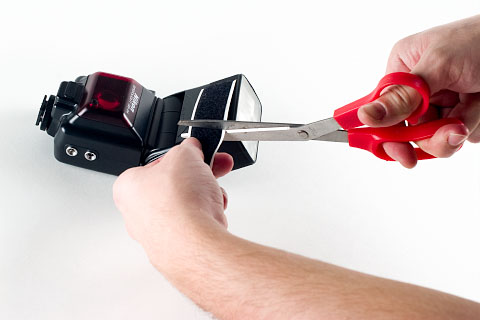 Measure and cut velcro into 4 pieces for the sides of the flash