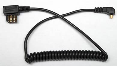 Coiled Cord — Male PC to Metz 6 Row Sync Cord